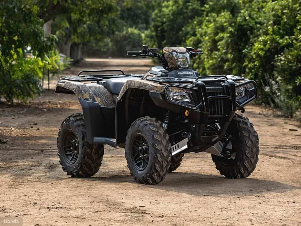 Honda Fourtrax Foreman Rubicon 4X4 EPS Parked on a Dirt Road